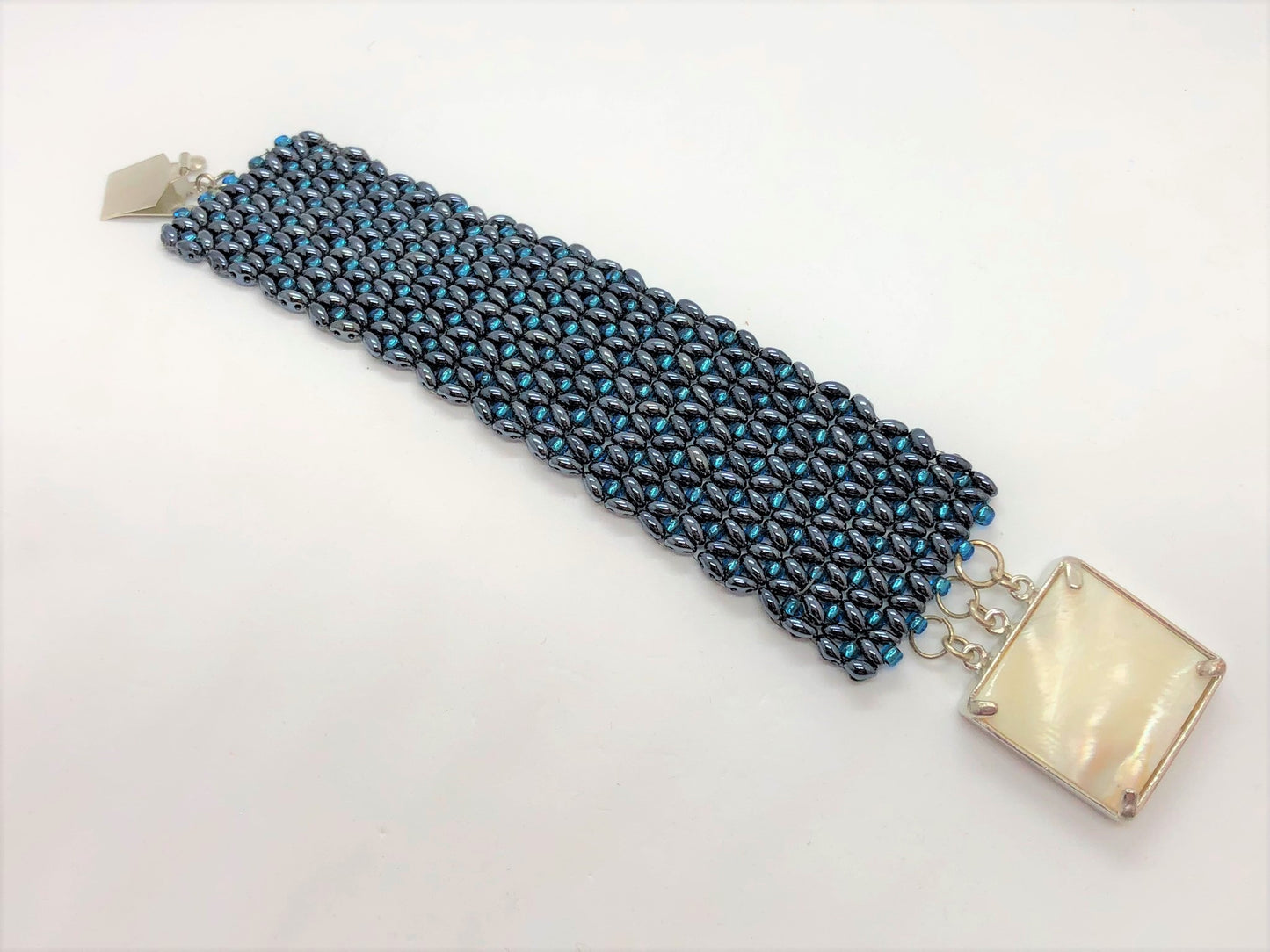 Blue and Gunmetal X&O hand sewn bracelet - Emmis Jewelry, Bracelets, [product_color]